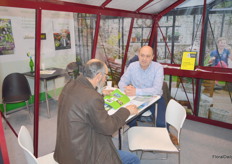 Lieve Develtere (ACD) in one of their hobby greenhouses